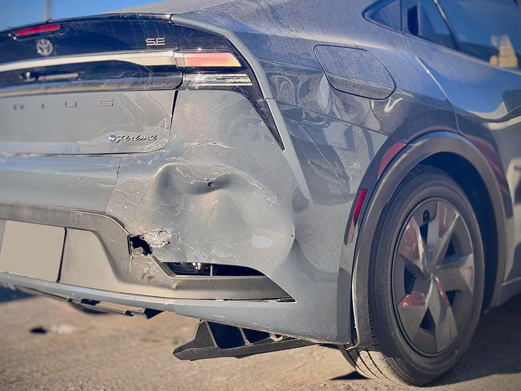 Toyota Prius Prime rear-end collision damage.